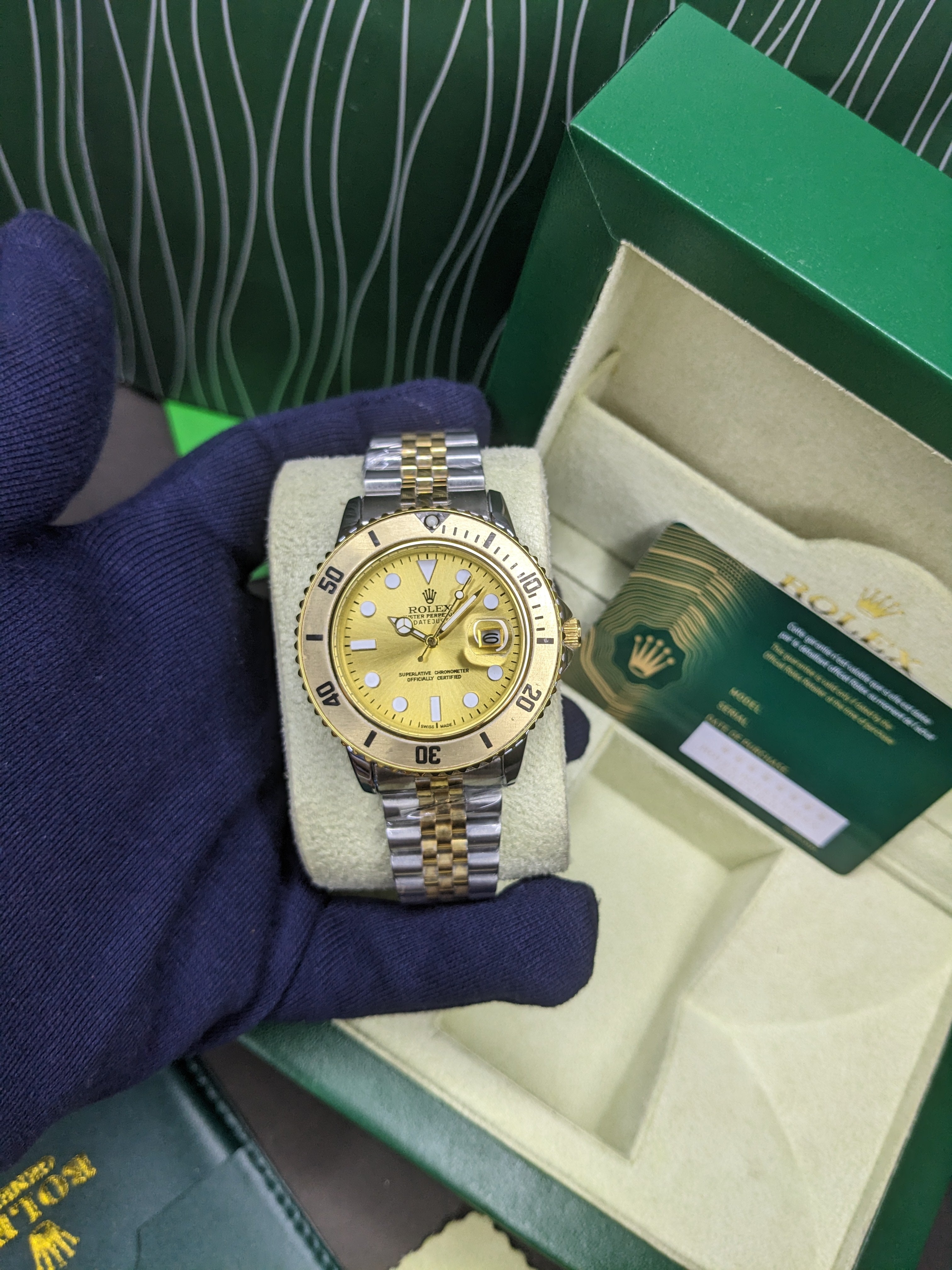 Rolex Submariner golden rotating dial with jublilee bracelet