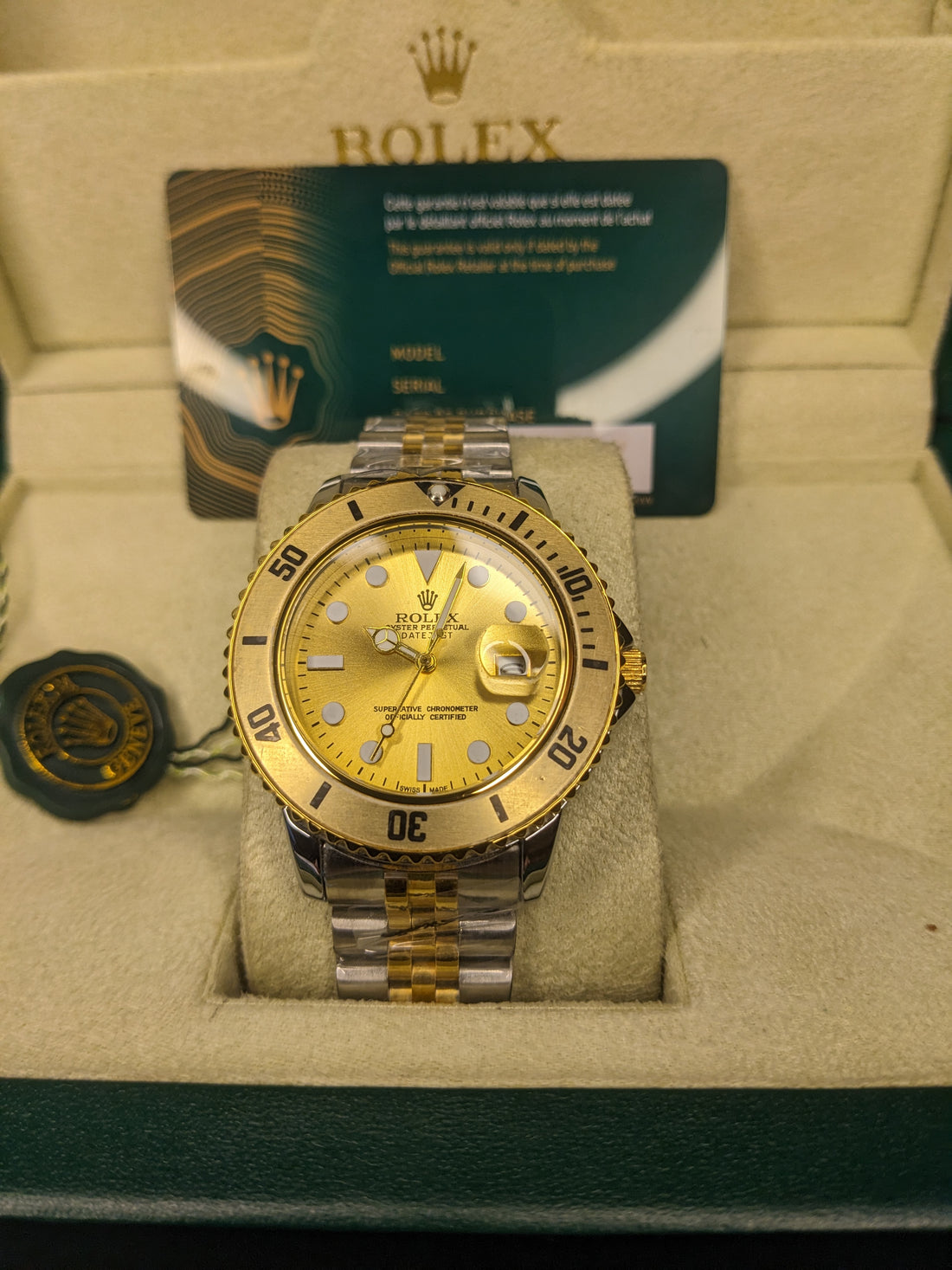 Rolex Submariner golden rotating dial with jublilee bracelet