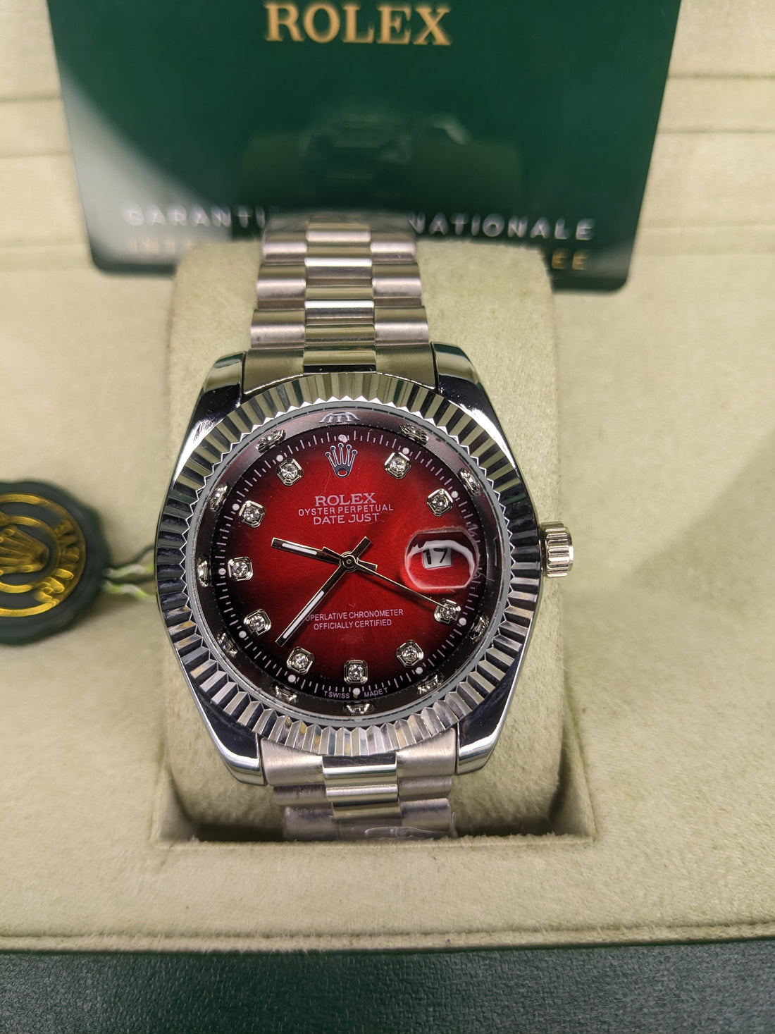 Rolex automatic movement silver with red dial