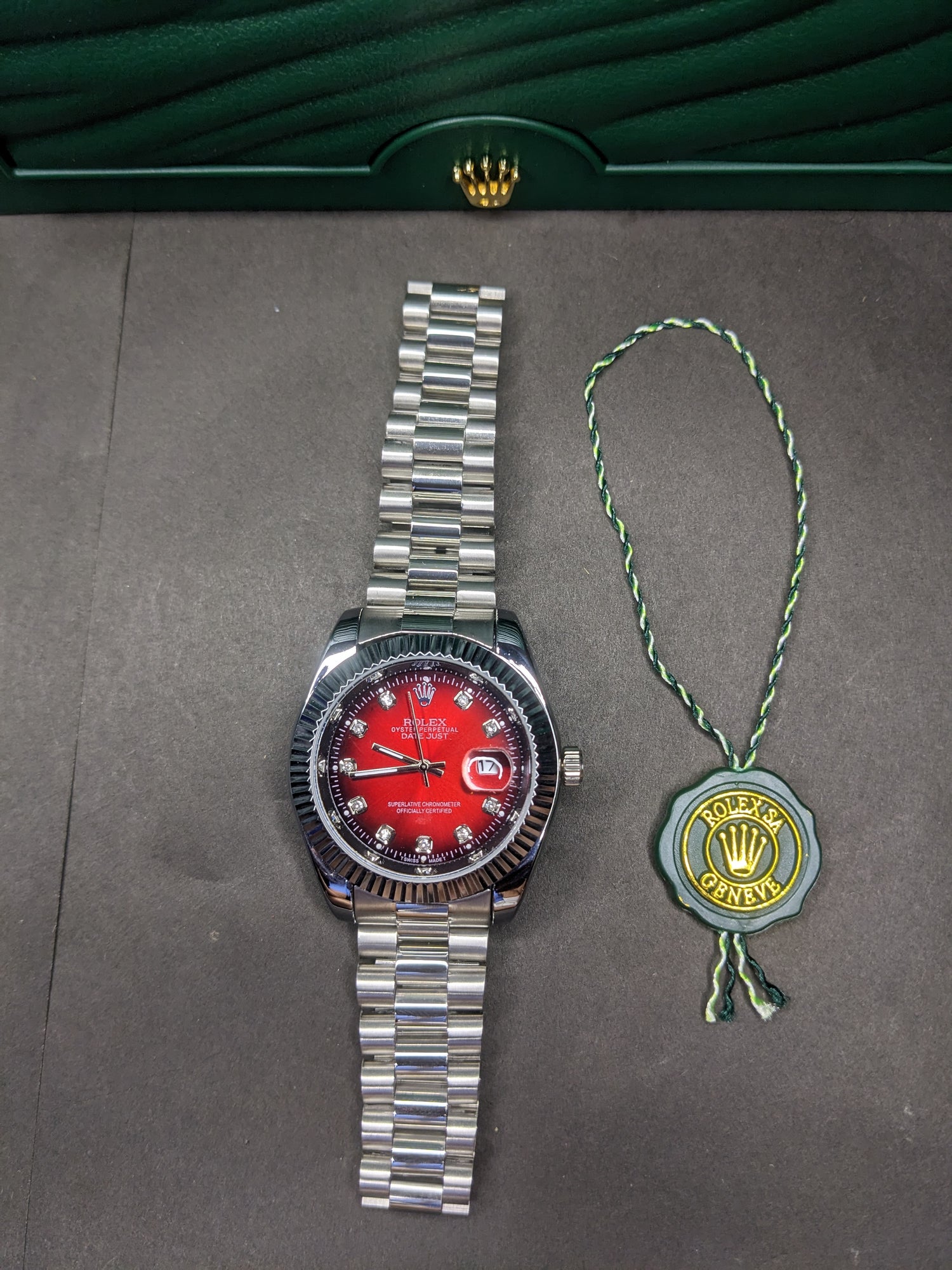 Rolex automatic movement silver with red dial