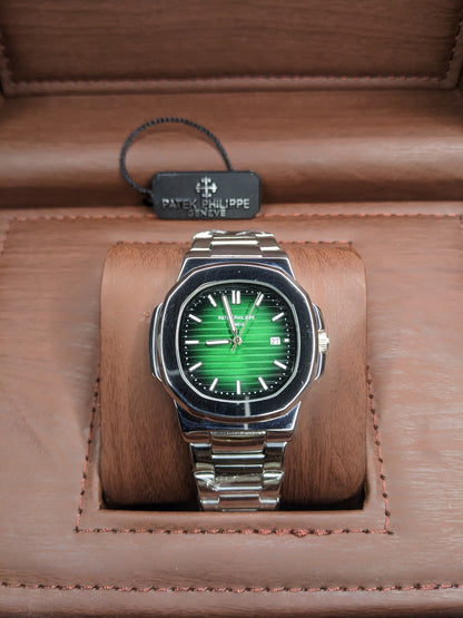 Patek philippe stainless steel With a green dial.